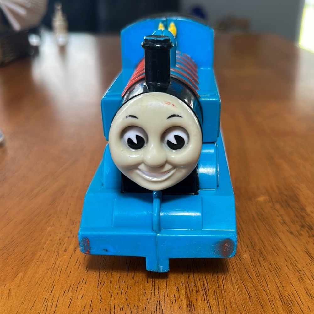 Thomas the tank engine train whistle. Plastic. Still sounds good.